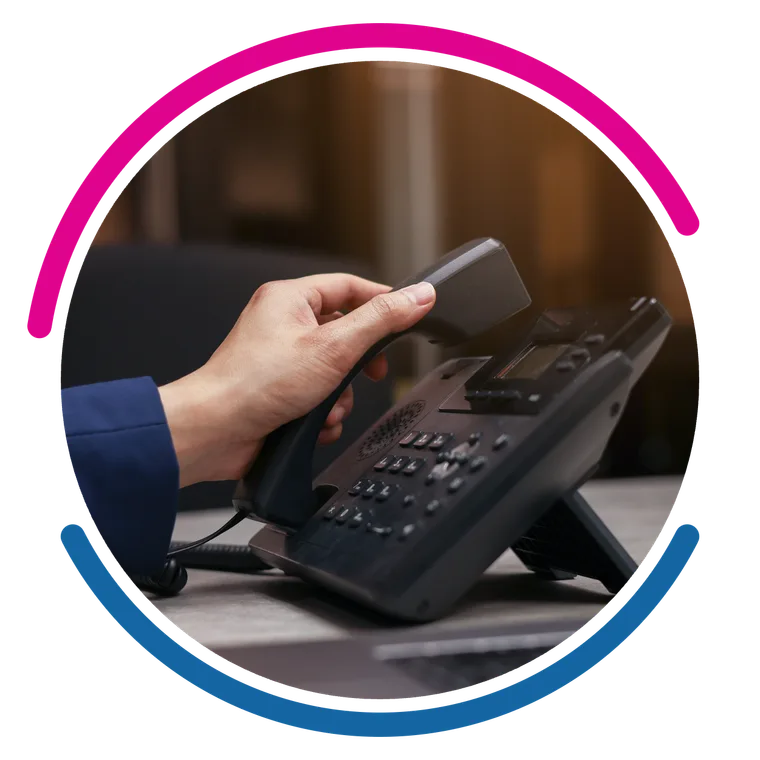 A desk handset in use after a number transfer