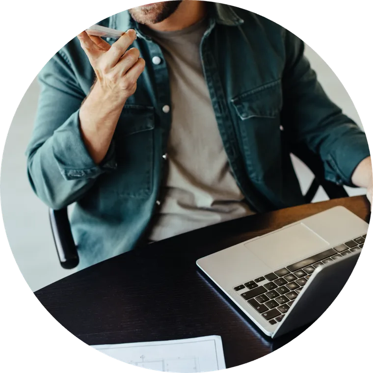 A home worker taking a business call at their desk
